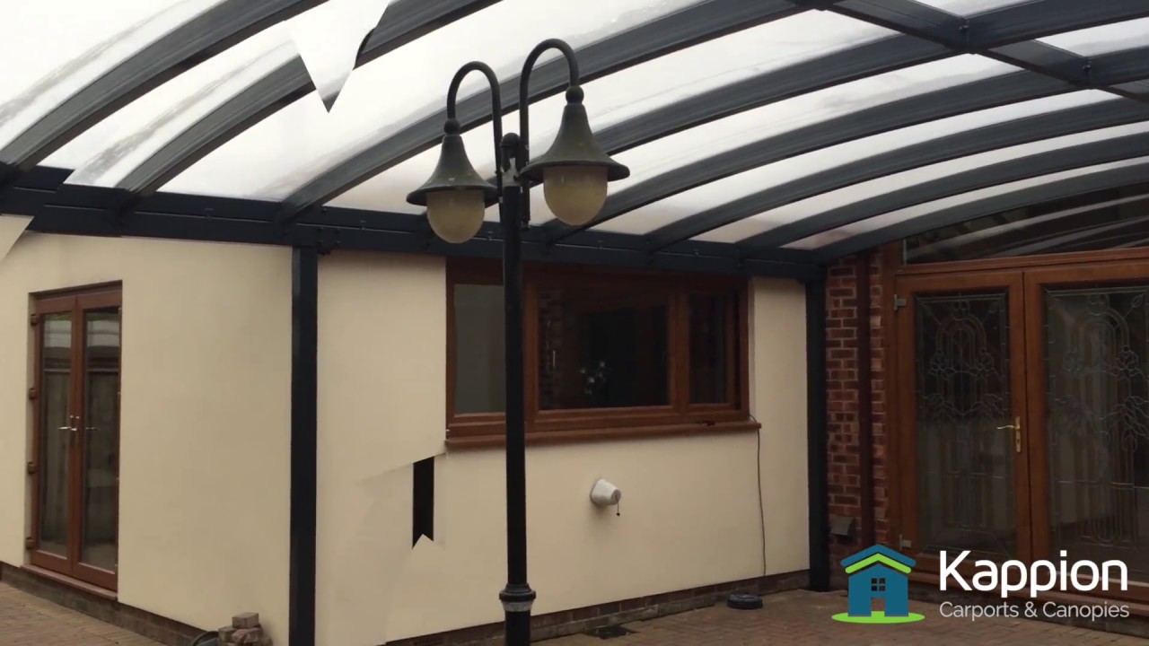 A Contemporary Courtyard Carport Canopy Installed in Warwickshire