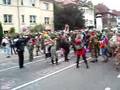 Clowns charge police at anti g8 demo