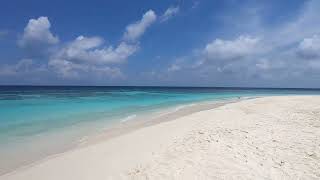 Diamonds Athuruga Maldives, beach glimpse - Junior suites side
