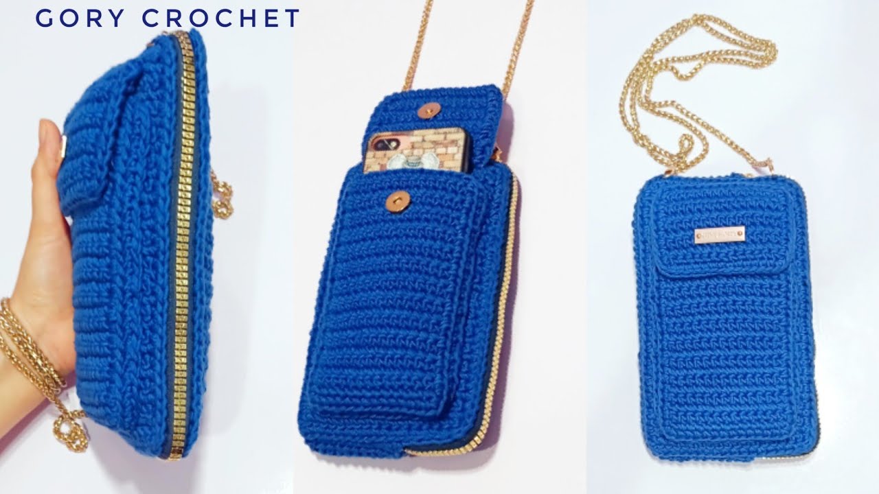 Вязаная крючком сумка с внешним карманом для мобильного телефона.