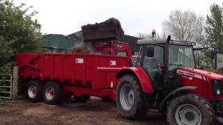 Massey 5455 & kubota m8540 mucking out.