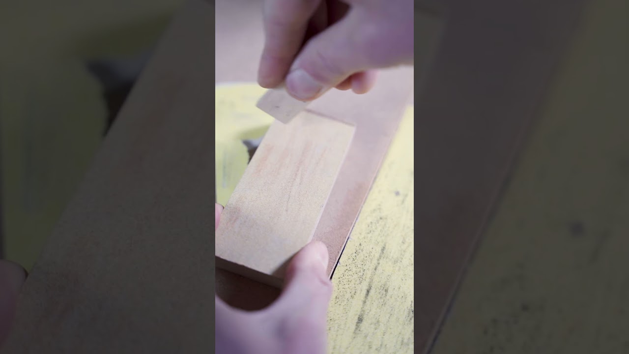 Fitting the latch just right using a shooting board and sand paper