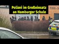 Polizei im groeinsatz an hamburger schule