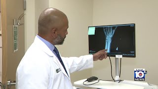 Doctor looking at alternative approach for fixing fractures Fixing Fractures
