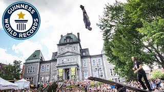 Acrobats set back flips record on teeter-totter - Guinness World Records