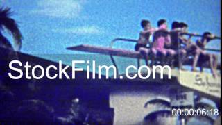 1962 Kid Swimming Race Across Luxury Hotel Pool And Diving Board. Miami, Florida