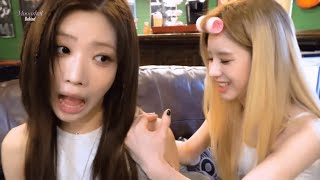 Haseul and Heejin giving Kim Lip a shoulder massage