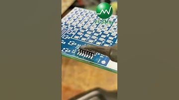 PCBMay Engineer Soldering a Chip with Precision | PCB Assembly Excellence