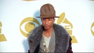 Pharrell Williams Auctions Off Hat For Charity | Splash News TV | Splash News TV