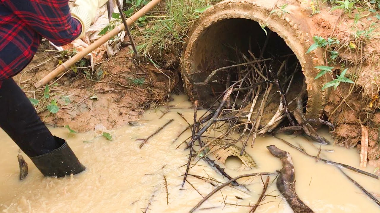 Unclogging Drains With Debris Stuck In Drain At Mountain - YouTube