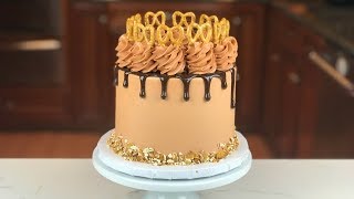 This is seriously one of my favorite cakes! chocolate layers, caramel
drizzle inside, swiss meringue buttercream, and topped with ganache...