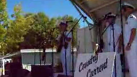 Wayne Taylor of the U.S. Navy Band sings the Natio...