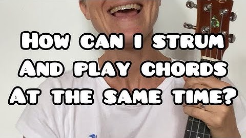 Play chords and strum at the same time on ukulele