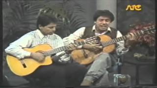 Video thumbnail of "Cuti y Roberto Carabajal - Aquel tiempo de mi infancia."