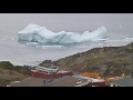 Big iceberg capsizing at Tasiilaq, East Greenland