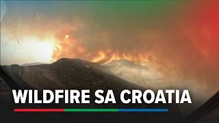 Firefighting plane captures wildfires raging across Croatia's Dalmatia region | ABS-CBN News