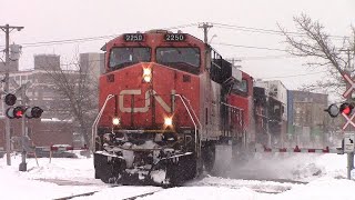 Long CN Stack Train 120 through Downtown Moncton, NB as Snow Storm Moves In