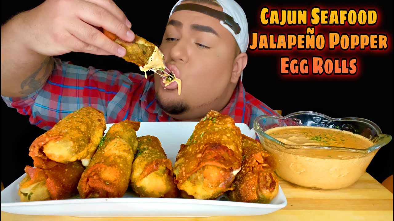 CHEESY CAJUN SEAFOOD JALAPEÑO POPPER EGG ROLLS W/ SPICY CAJUN CREAM