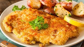 Pork Schnitzel on the grill over hot charcoal comes out perfect like deep fried