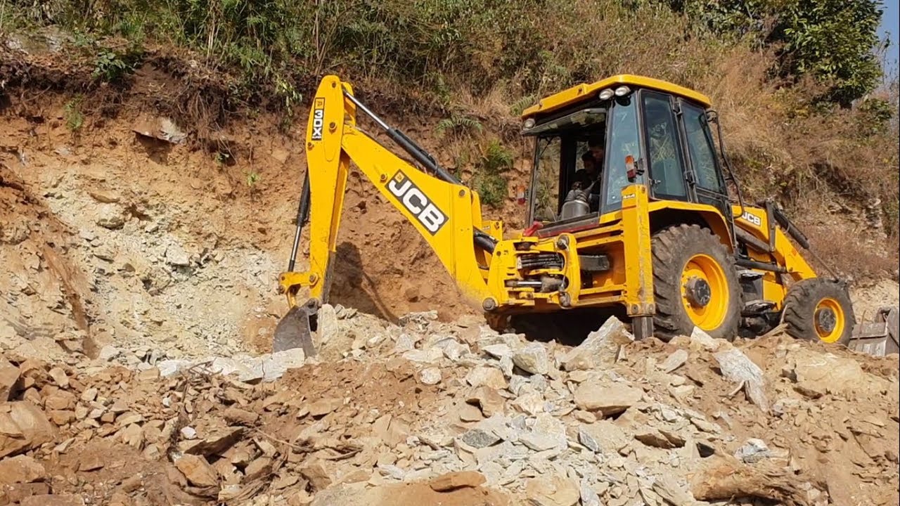 JCB Backhoe, Expert Operator and Stony Hill-Construction of Hilly Road
