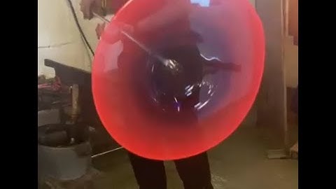 Glassblowing a large platter at Jerpoint Glass Studio