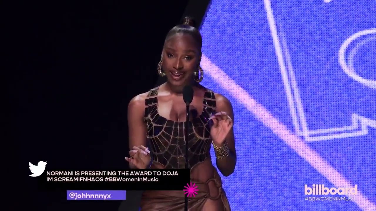 Normani presents DojaCat with the POWERHOUSE Award at 2022 Billboard Women In Music