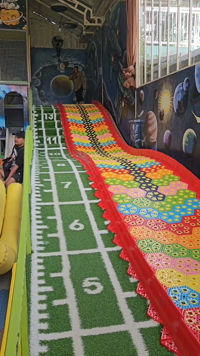 main perosotan pelangi #wahanapermainananak #rainbowslide