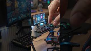 Human hand places tiny keyboard 202606170711