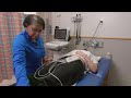 Performing An ECG On A Teenage Girl 