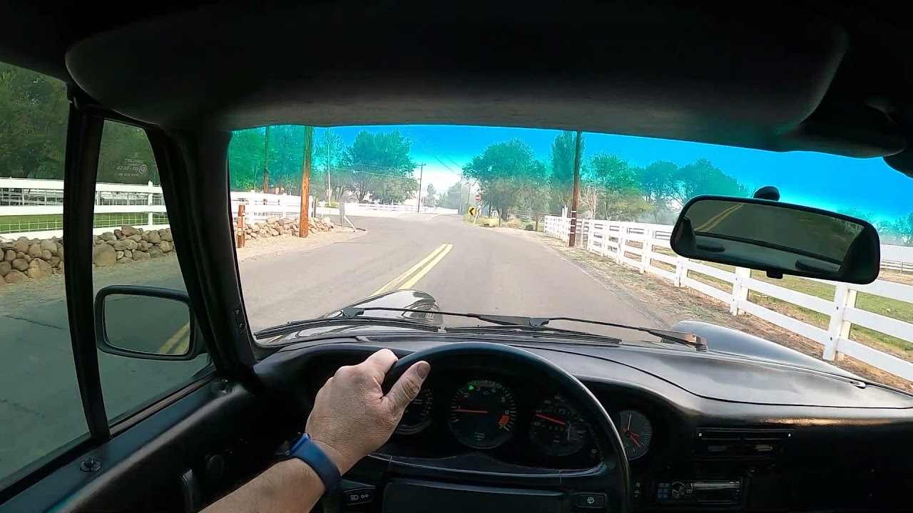 POV Drive in town, 1986 Porsche 911 paint to sample.  Bring a Trailer