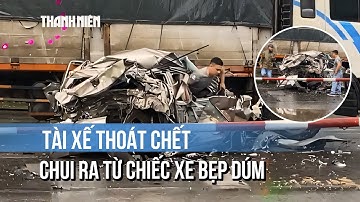 Thoát chết kỳ diệu: Tài xế chui ra khỏi ô tô bị "vò nát" trên Quốc lộ 1