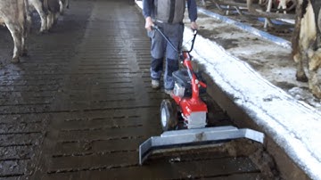 Honda walk behind yard scraper