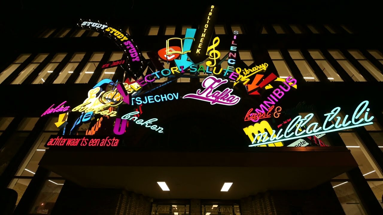 Maarten Baas adds Las Vegas-style signs to Utrecht library