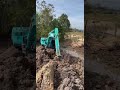 Amazing Excavator working in muddy soil