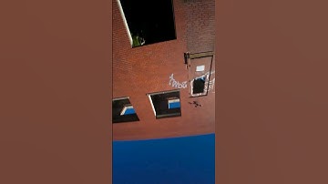 powerlooping into a 3rd story window!! #fpv #fpvfreestyle #vannystyle #shorts #dji