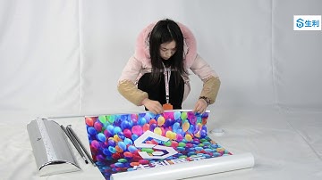 Wide base roll up banner stand assemble video.