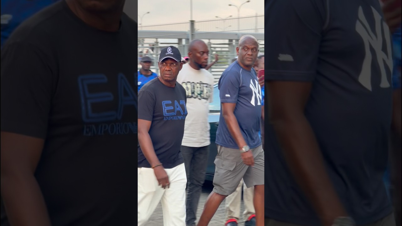 Former Super Eagles coach Augustine Eguavoen arrives  with Eric Chelle  for the training session