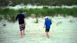 Placing A Peace Rock On Eel Point In Nantucket