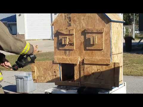 Firefighters train with dollhouse