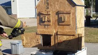 Firefighters train with dollhouse