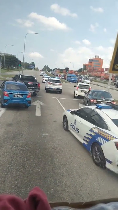 malaysia police escort