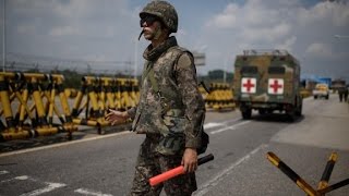 Koreas reach deal, de-escalate tensions