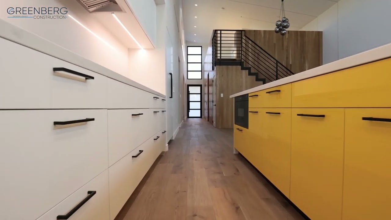 Custom Home Build in Redwood City | Yellow Kitchen + Outdoor Living by Greenberg Construction