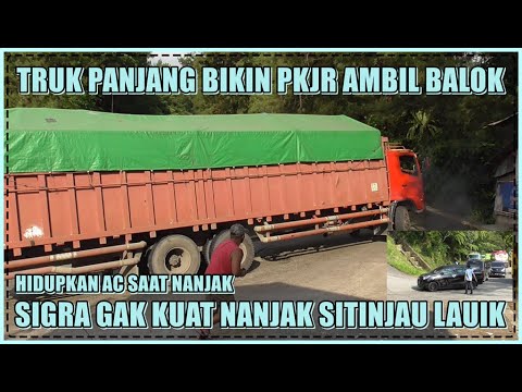  Truk Panjang  dan Mobil Sigra Bikin Heboh Sitinjau Lauik 