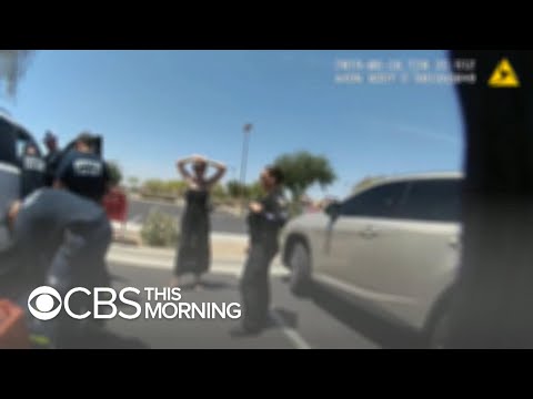 Video: Policijas amatpersona mīlīgi pieņem zīdaini, kuru viņš izglāba no karstā automašīnas
