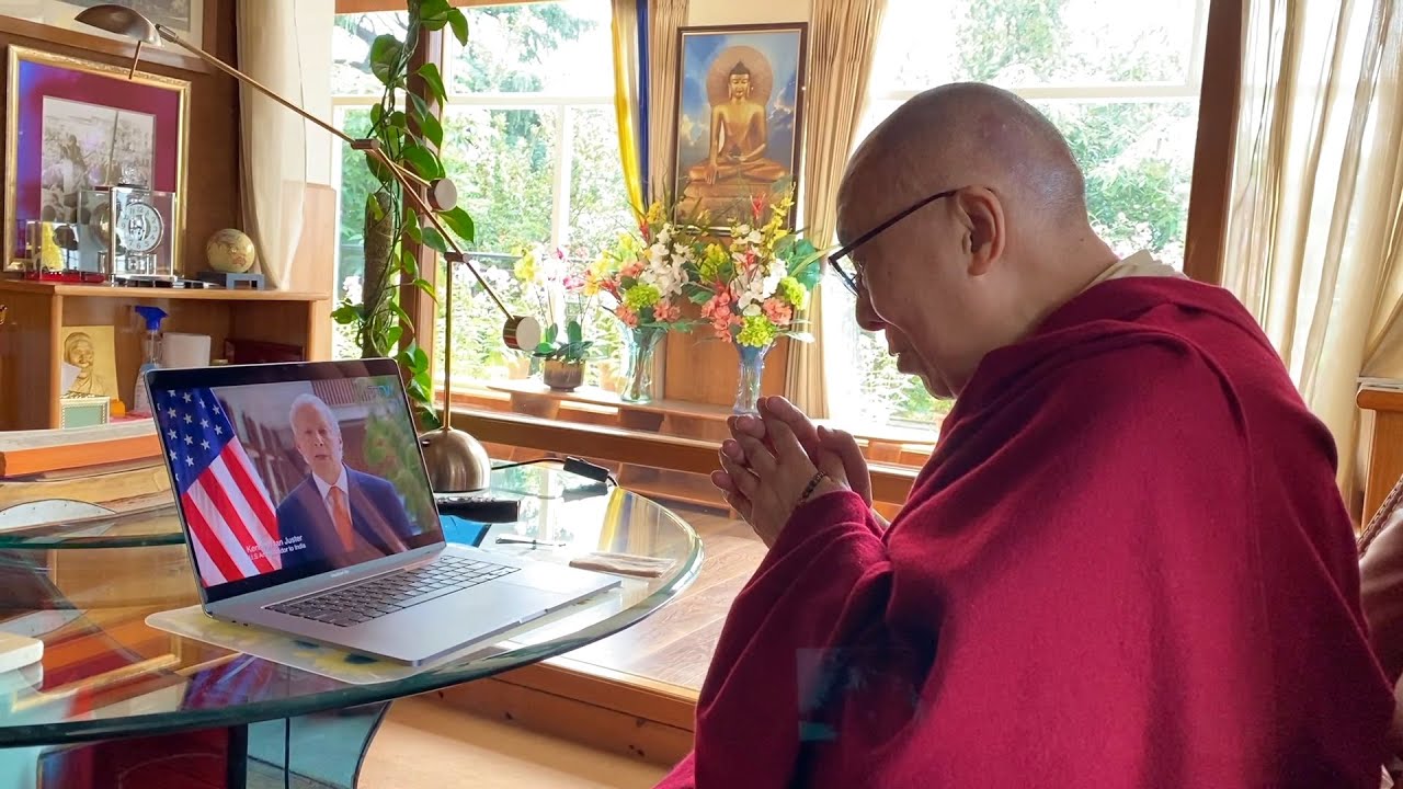 His Holiness the Dalai Lama watches the video of his birthday wishes.
