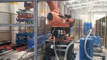 KUKA robots for sorting, palletizing and stacking of water bottles