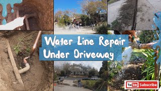 Water line repair under driveway