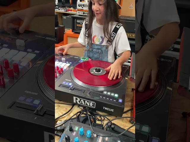 9 years old Dj Michelle scratching on Rane Twelve turntable class=