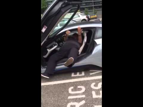 Fat man gets out of BMW i8